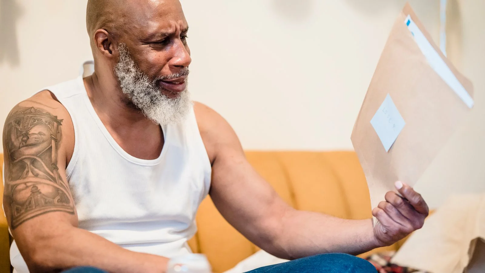 Florida senior man looking concerned while reviewing his Medicare plan documents, illustrating common AEP mistakes to avoid